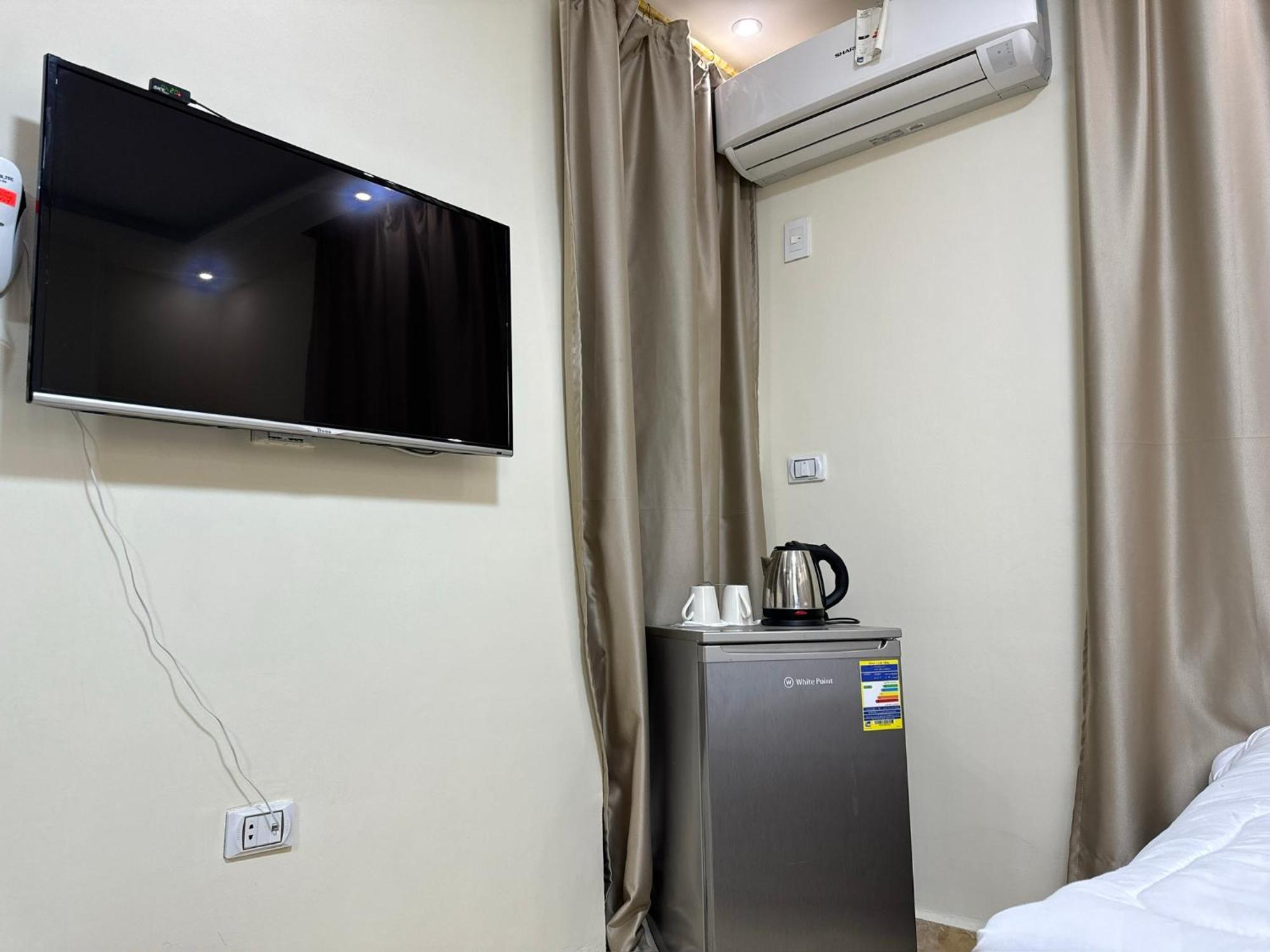 Pyramids Gardens Hotel Ghatati Bagian luar foto